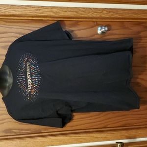 Black tshirt that says Tupperware. Size 4x